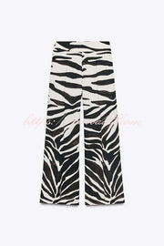 Breath of Freedom Animal Print High Rise Pocketed Wide Leg Pants